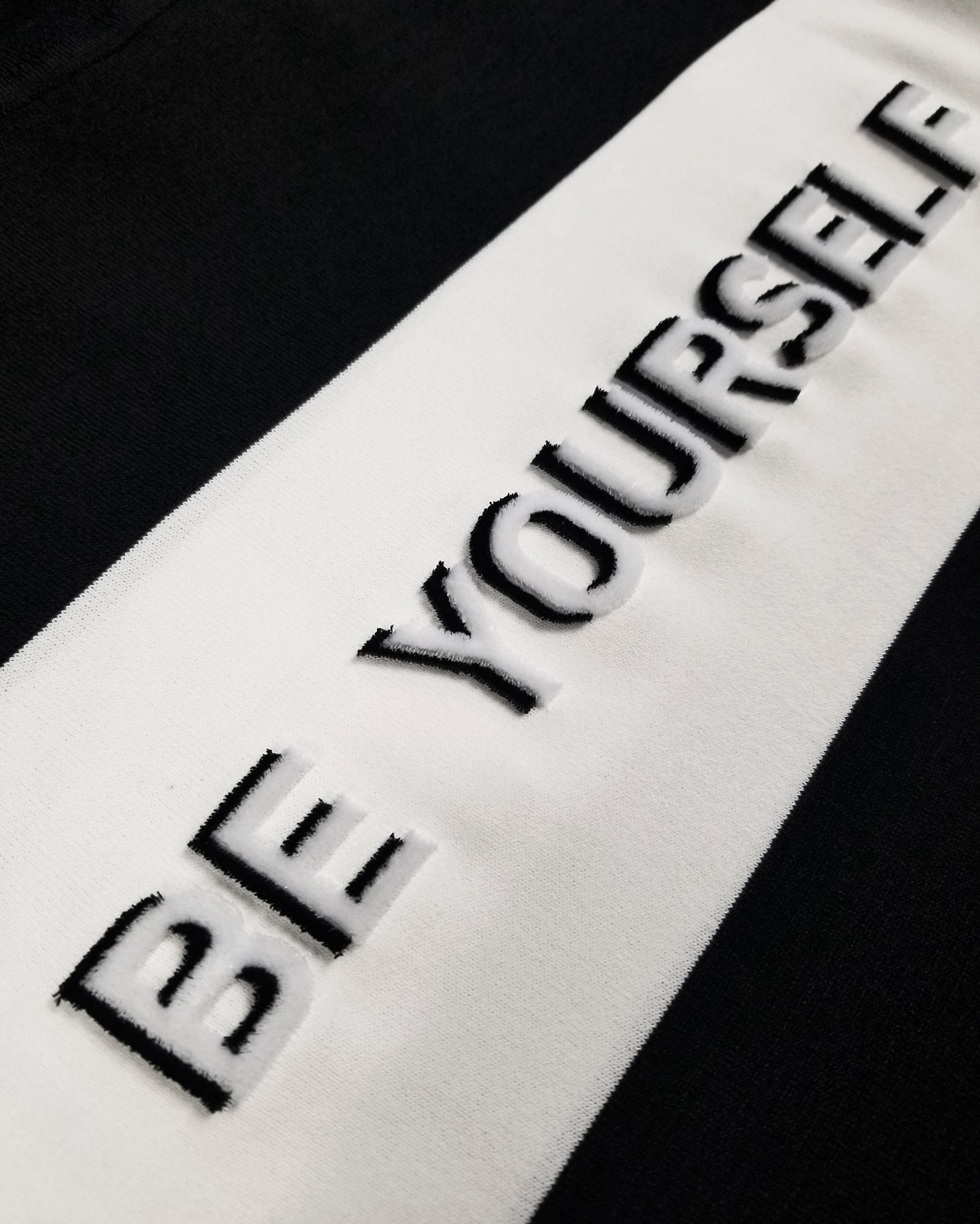 Black “BE YOURSELF” Sweater